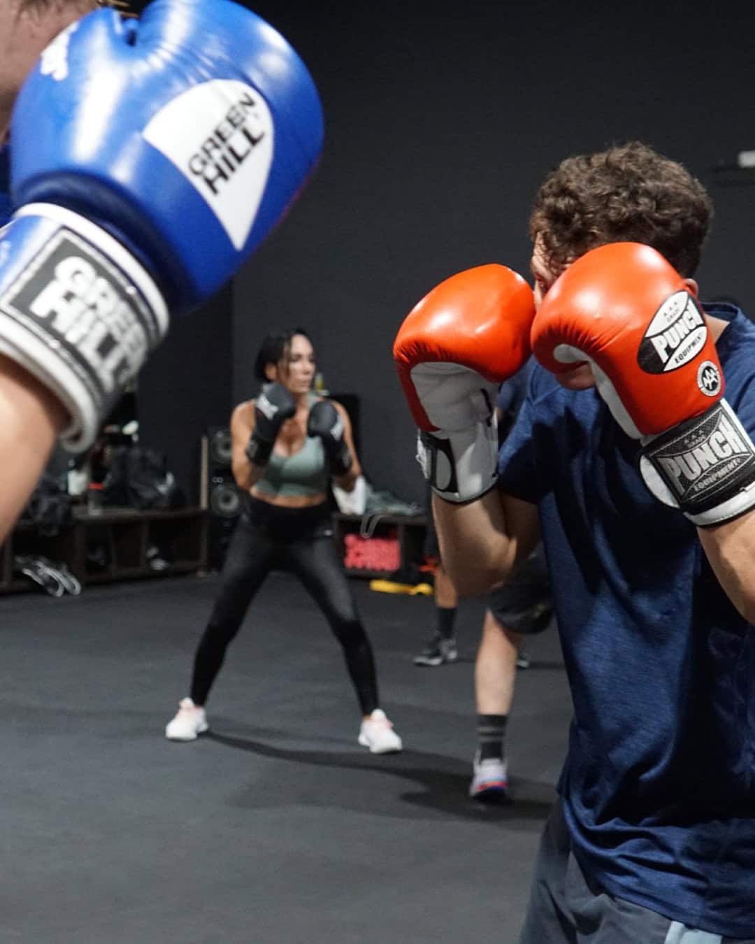 Sparring in boxing class