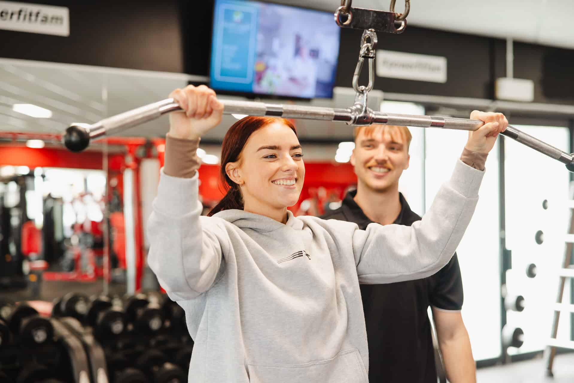 Girl doing lat pulldown